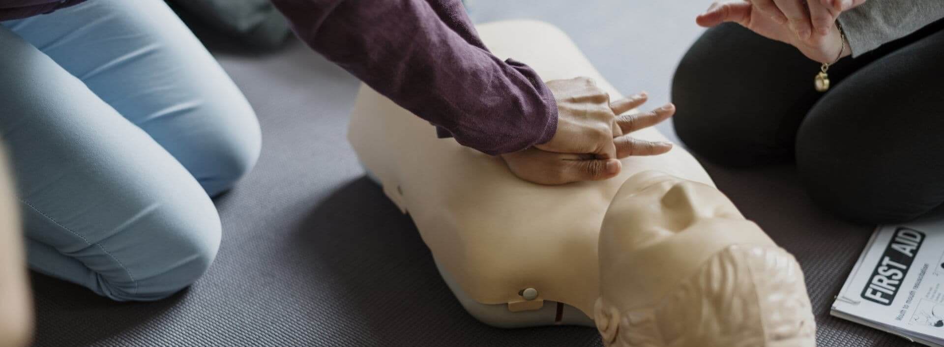 woman doing cpr